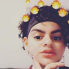 Mya in 2019 toning it down for school.